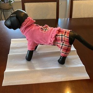 Puppia pink and black onesie .